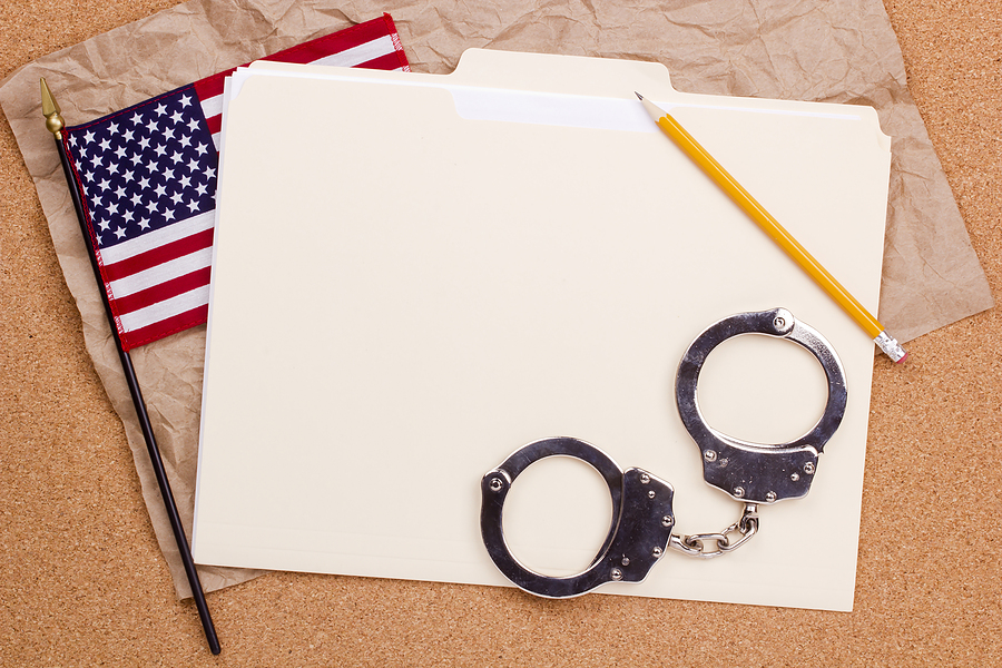 American Flag And Handcuffs